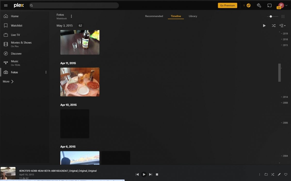 Plex's interface whilst loading photos from the user's library